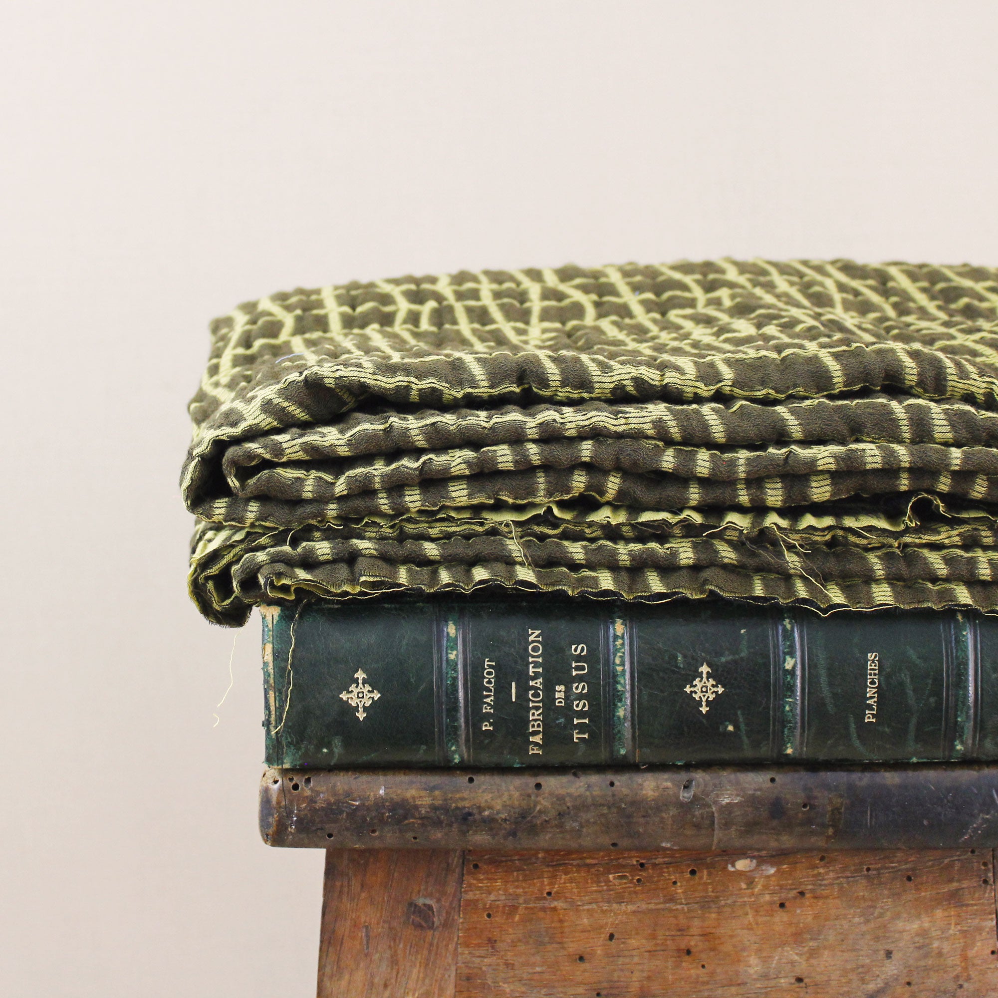 Reversible cotton jacquard fabric with olive green and khaki checks