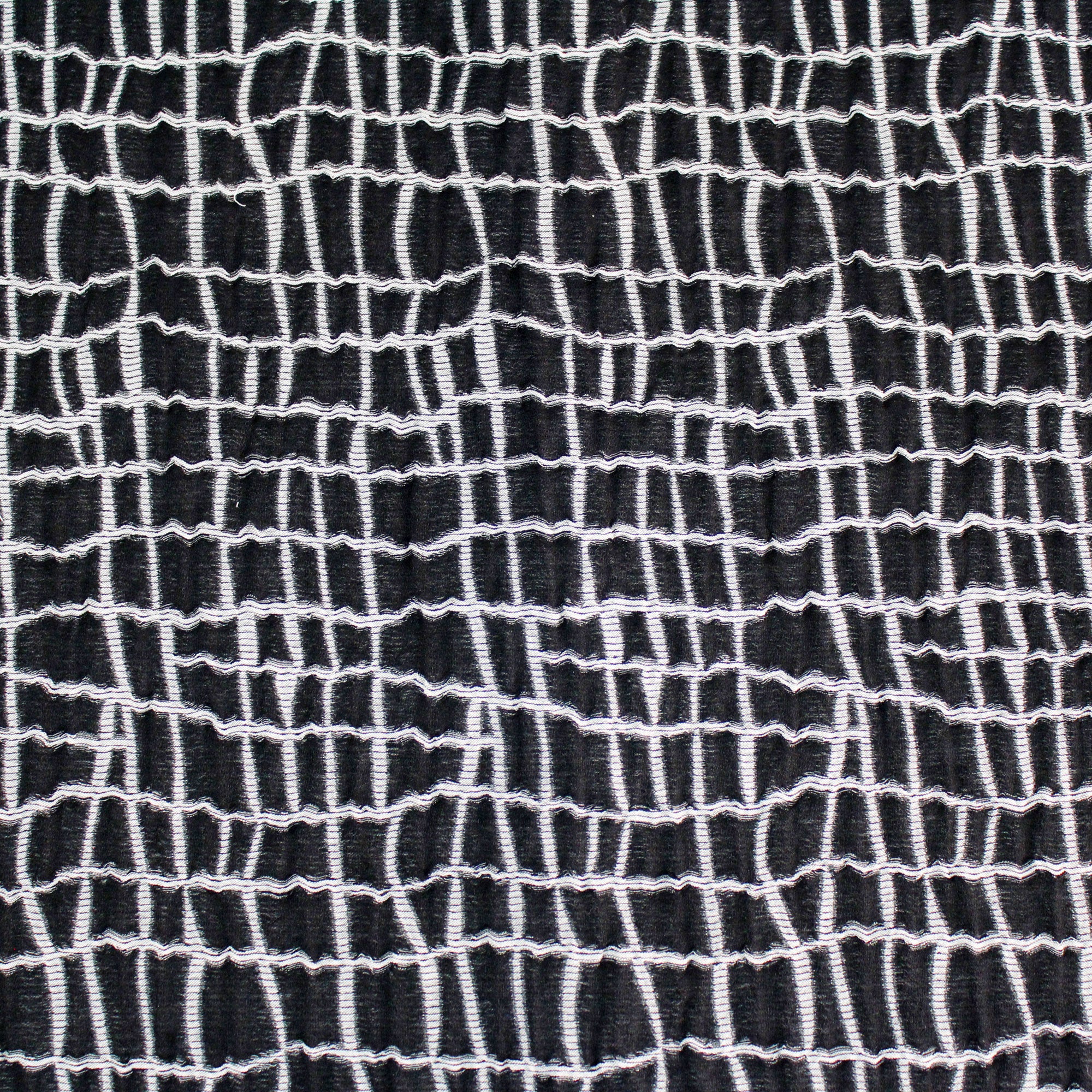 Tissu jacquard en coton réversible à carreaux noir et gris