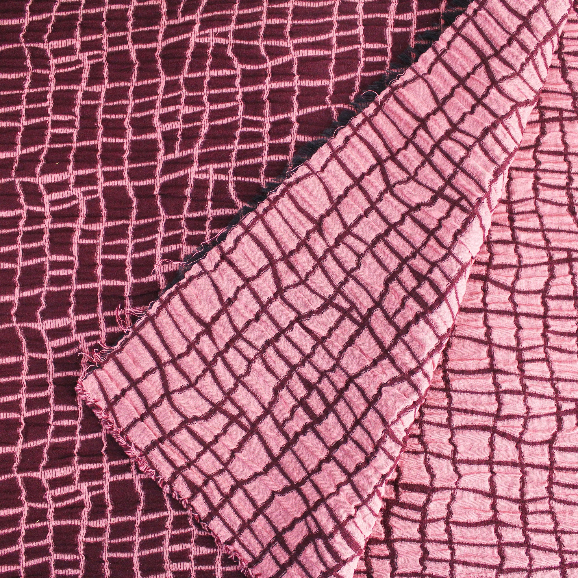 Tissu jacquard en coton réversible à carreaux bordeaux et rose