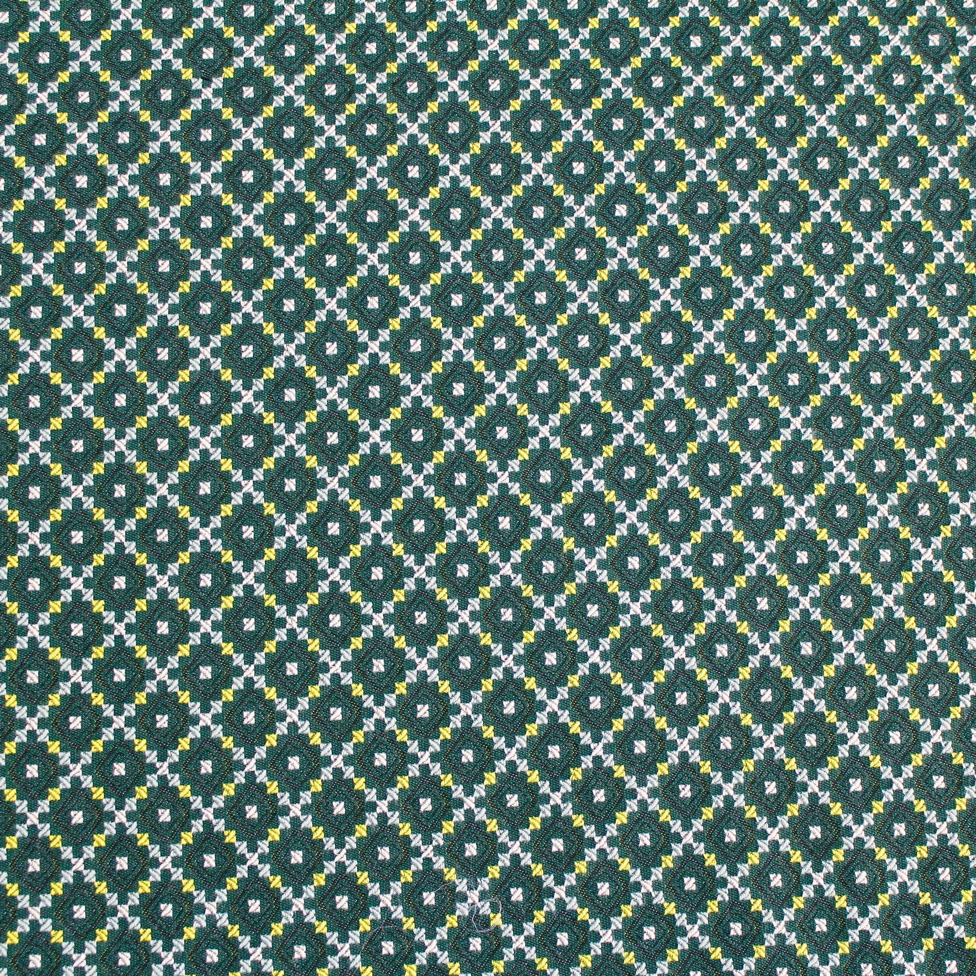 Reversible cotton jacquard fabric with green and yellow graphic patterns