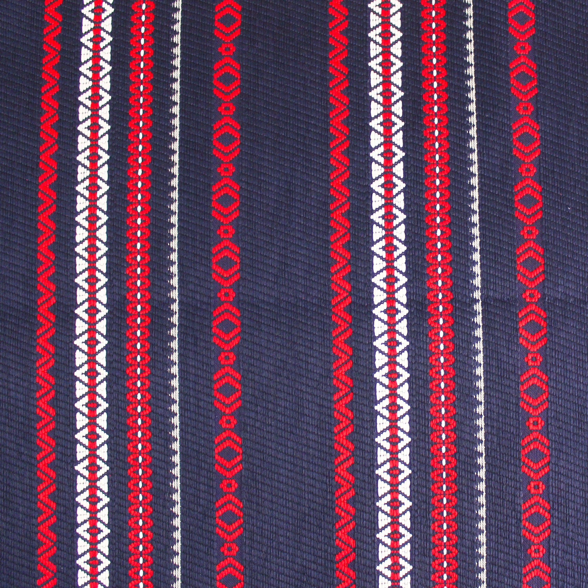 Cotton jacquard fabric with red and white graphic patterns