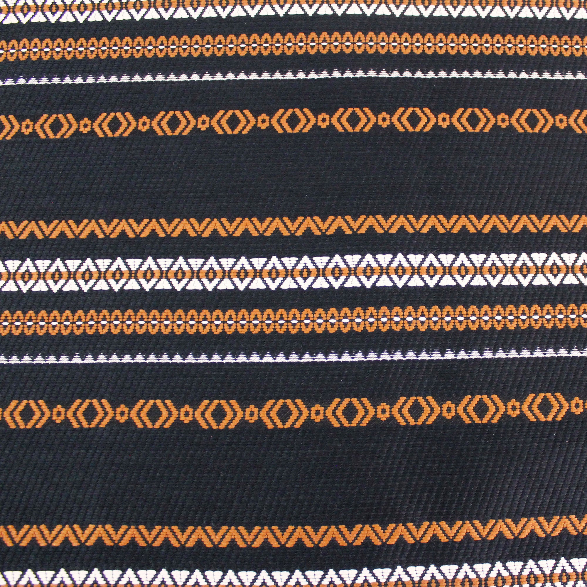 Cotton jacquard fabric with brown and white graphic patterns
